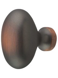 Primrose Smooth Oval Cabinet Knob - 1 3/8 inch x 7/8 inch in Aurora Bronze.
